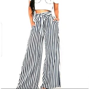 Woman's extra long flared Pleated polyester pants